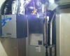 Hi efficient condensing gas furnace with an ultra quiet HRV
