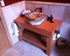 Custom vanity with a carved out rock sink